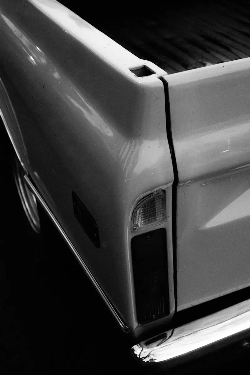 grayscale photo of car door